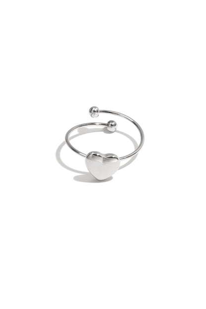 Silver heart-shaped lovey ring with a minimalist open-heart design shown on a white background from Sorea Fashion.