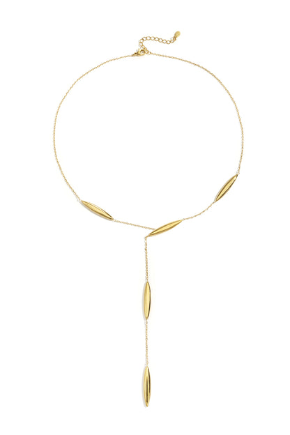 Gold Nova necklace featuring a round pendant with a delicate dangling charm displayed on a white background from Sorea Fashion.