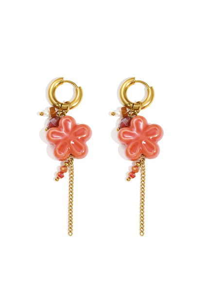 Red and pink flower-shaped Petal earrings with gold detail displayed on a white background from Sorea Fashion.