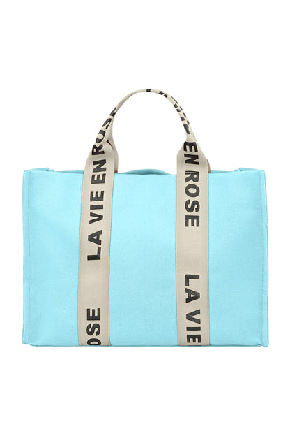 Blue Rose tote bag with gold-tone hardware and striped handles displayed on a white background from Sorea Fashion.