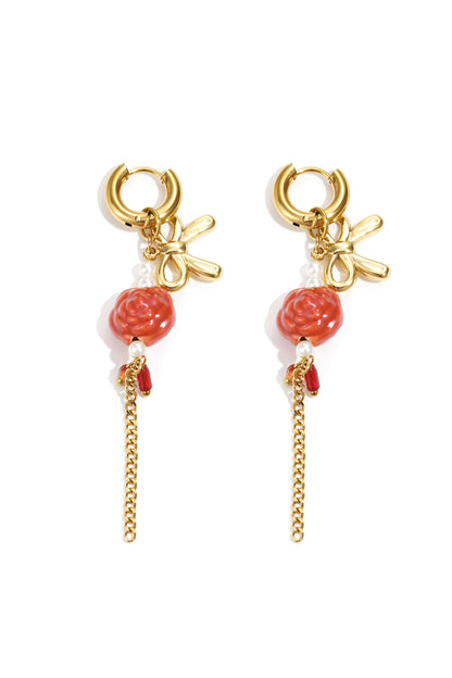 Gold Rosey earrings featuring small rose-shaped details displayed on a white background from Sorea Fashion.