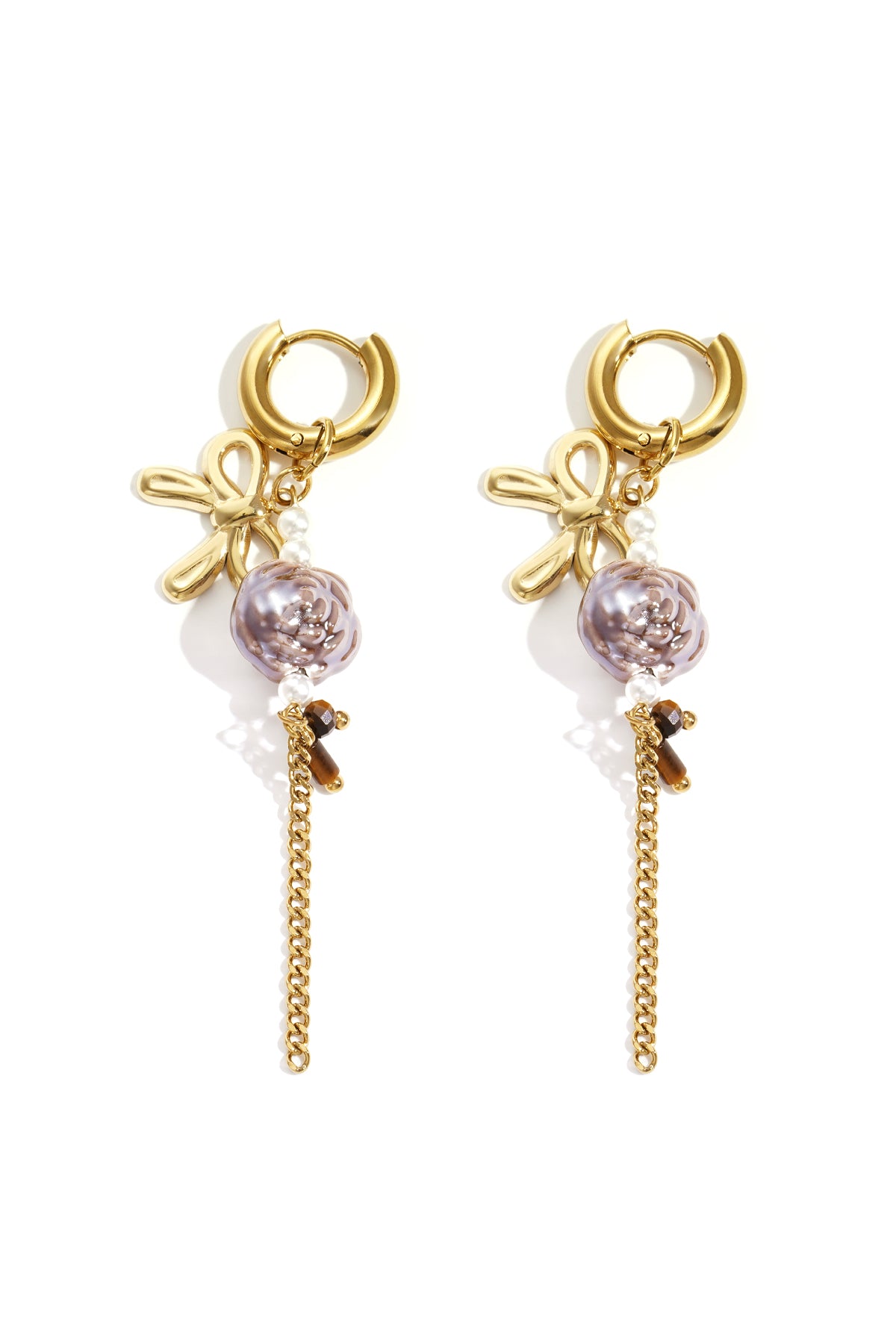 Gold rose-shaped Rosey stud earrings displayed on a white background from Sorea Fashion.
