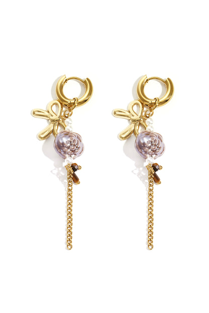 Gold rose-shaped Rosey stud earrings displayed on a white background from Sorea Fashion.